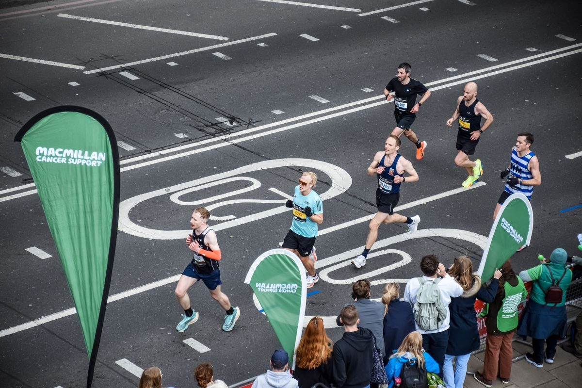 Overhead view of a London road race with spectators.